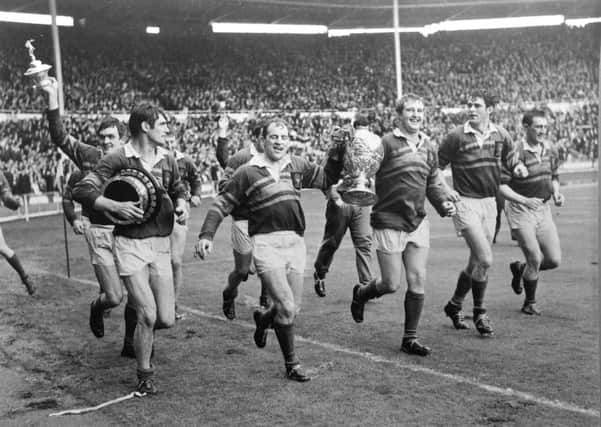 Famous victory: 

Leeds celebrate their 1968 Cup final success