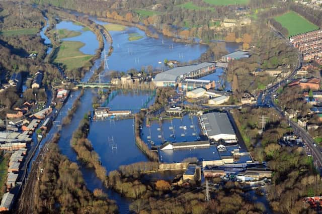 Aerial picture over the Kirkstall Road area of Leeds, West  Yorkshire, where flooding has occurred after the monumental amount of rain has caused the river Aire to burst its banks. See Ross Parry copy RPYFLOODS