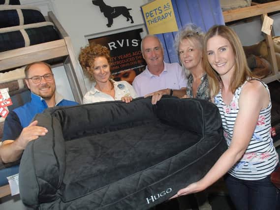 Left to right, Matthew Robinson of Pets As Therapy, Gemma Wilcock store manger of Orvis Harrogate, Terry Ryan, Sally Ryan and Chloe Darcy.