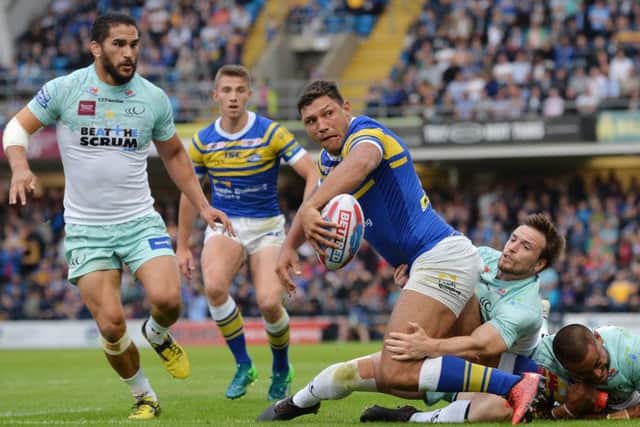 Ryan Hall looks to off-load against Widnes.