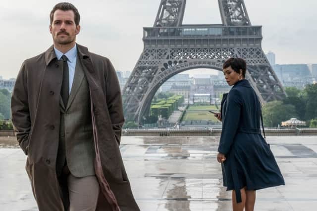 Henry Cavill as August Walker and Angela Bassett as Erica Sloane. PIC: PA