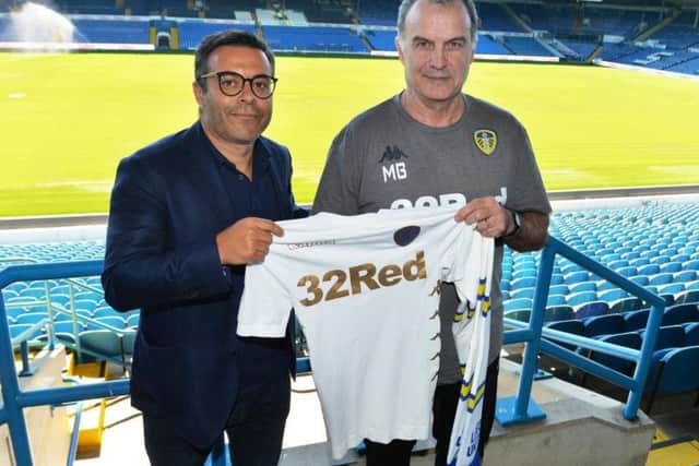 Leeds United manager Marcelo Bielsa (R) and owner Andrea Radrizzani (L).