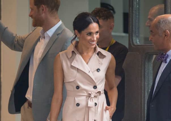 CELEB GET THE LOOK: The Duchess of Sussex, seen at the Nelson Mandela centenary exhibition, keeps her make-up simple, just full lashes plus blush and matching lip gloss. Try Joan Collins Timeless Beauty Divine Lips, Â£18, and Contour Velvet Blusher, Â£22, Marks & Spencer. Picture: Dominic Lipinski/PA Wire