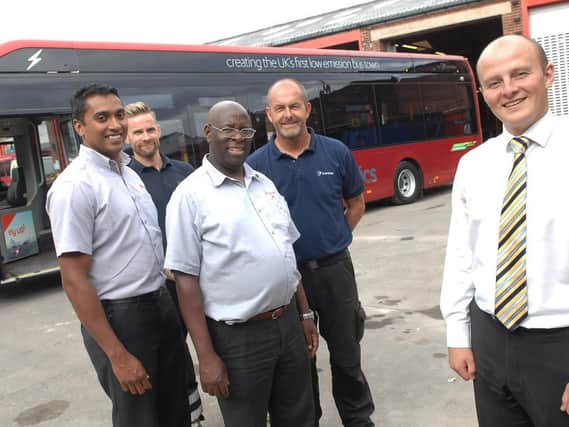 Marketing and communications manager Ben Mansfield with Bijumon George(driver), Jonathan Ruston(engineer). Bornwell Jera (driver) and Peter Devaney (supervisor).