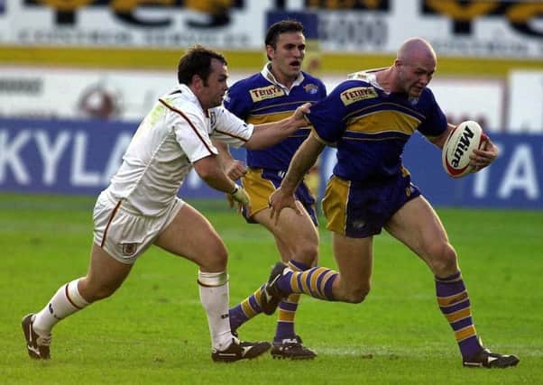 Keith Senior tries to round the tackle of Bradford's Justin Brooker.