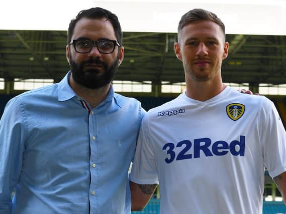 WELCOME TO LEEDS: New Leeds United recruit Barry Douglas pictured with director of football Victor Orta.