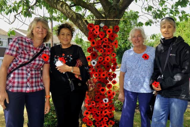 Residents knitted poppies to help mark the occasion.