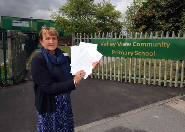 Headteacher Sarah Griggs is pictured with letters from Children, to the water company , outside Valley View Community Primary School, Leeds..30th July 2018 ..Picture by Simon Hulme