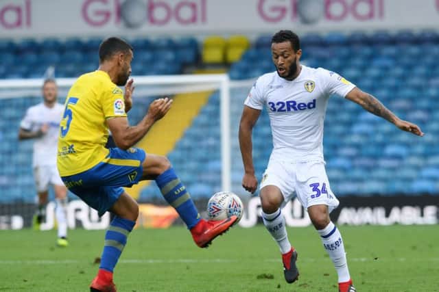 AIMING HIGH: Leeds United's Lewis Baker takes on Las Palmas' David Garcia.
Picture: Jonathan Gawthorpe.