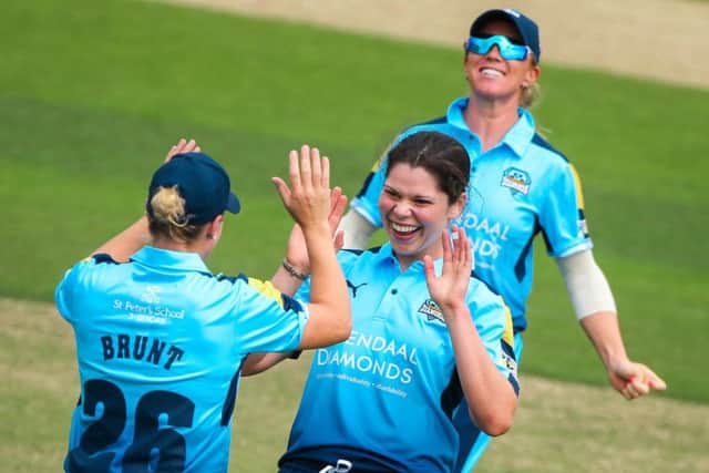 Yorkshire's Alice Davidson-Richards celebrates taking the wicket of Lancashire's Nicole Bolton.