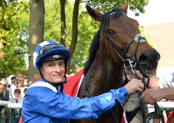 Dane O'Neil and Battaash in the winners circle after the Armstrong Aggregates Temple Stakes (Class 1) at Haydock Park in May this year. PIC: Anthony Devlin/PA Wire