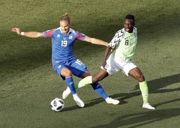 Nigeria and Stoke's Oghenekaro Etebo, right.