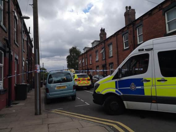 The police cordon in Holbeck, Leeds where the road is closed