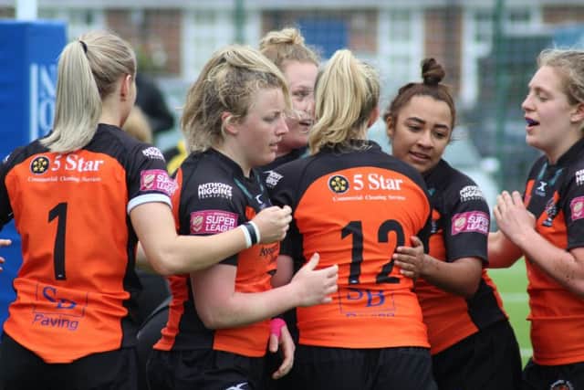 Castleford Tigers women's team celebrate.