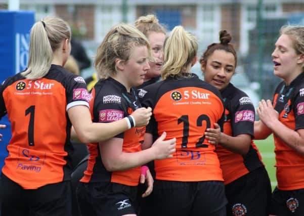 Castleford Tigers women's team celebrate.