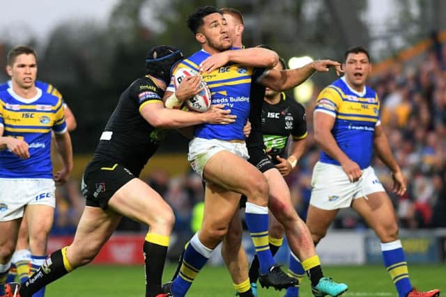 Nathaniel Peteru is tackled in the clash between Leeds Rhinos and Warrington in May.