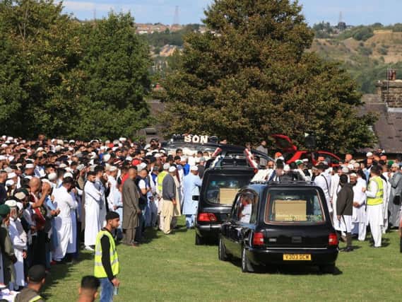 Thousands of people attended the funeral in Bradford
