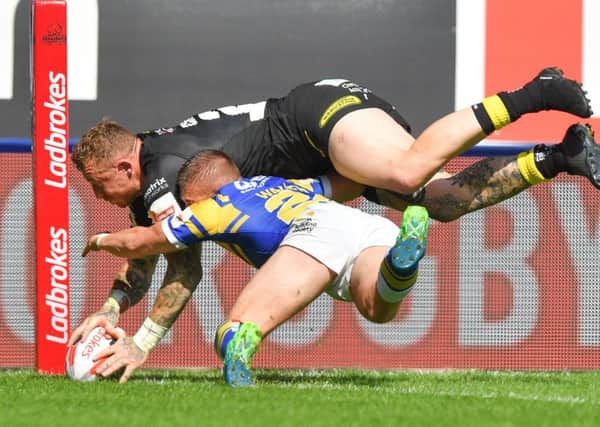 Josh Charnley scores Warrington's second try against Leeds Rhinos.