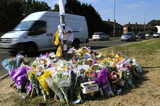 Floral tributes at the scene. PIC: Jonathan Gawthorpe