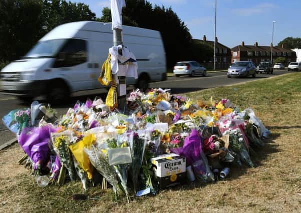 Floral tributes at the scene. PIC: Jonathan Gawthorpe
