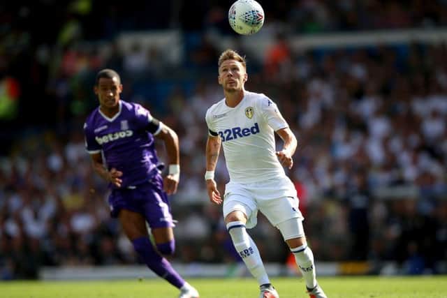 Leeds United's Barry Douglas (right) gets ahead of Tom Ince. PIC: Nigel French/PA Wire