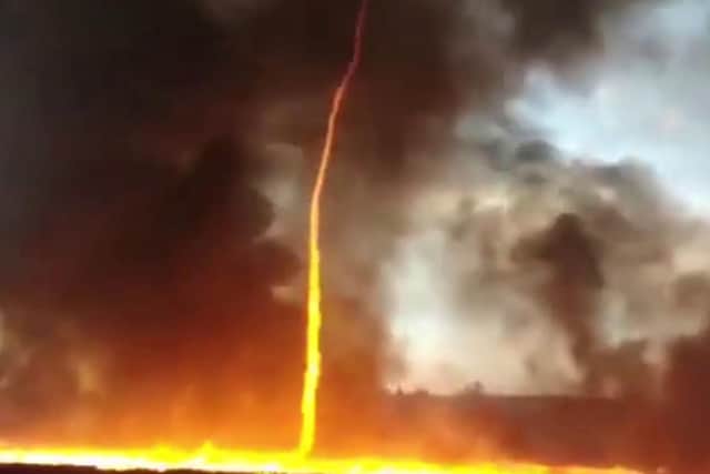 A screengrab taken from a video supplied by Leicestershire Fire and Rescue Service showing the moment a "firenado" engulfed a plastics factory in Swadlincote, Derbyshire. PIC: Leicestershire Fire and Rescue Service/PA Wire