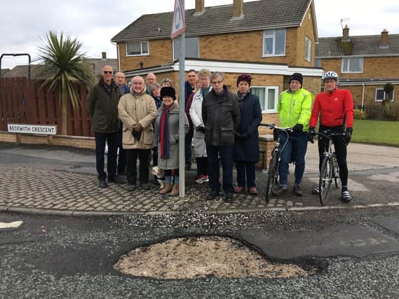 Residents of Beckwith Road have been calling for the potholes to be addressed for years.