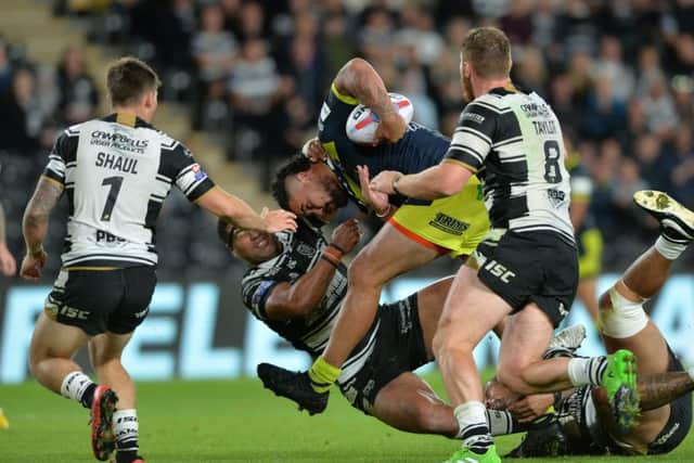 David Fifita is held short of the line.