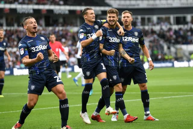 Leeds United's Mateusz Klich celebrates scoring the opening goal against Derby County.