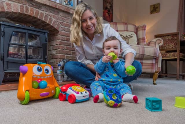 Andrewa Jenkyns MP and her young son Clifford.