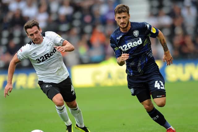 Mateusz Klich is action at Derby County.