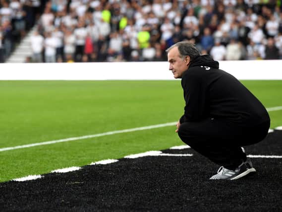 Marcelo Bielsa watches from his technical area during Leeds United's 4-1 rout of Derby County.