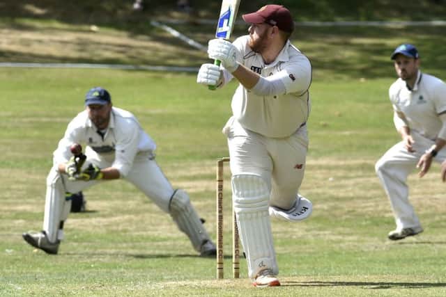 Alasdair Fearns, of St Chads, clops the ball legside against New Rover. PIC: Steve Riding