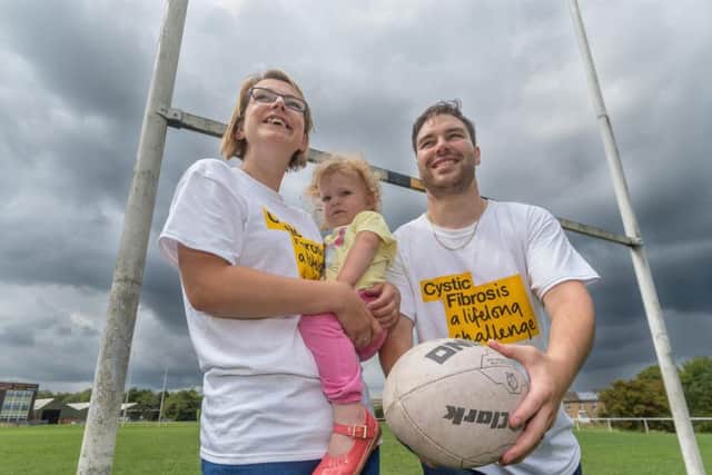 Natasha and Steven McIntyre, with their daughter Amelie, aged two, who has Cystic Fibrosis