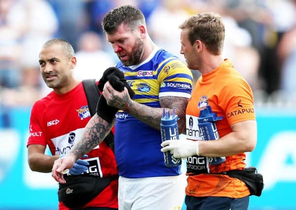 Brett Delaney is helped from the field at Castleford after sustaining a facial injury.