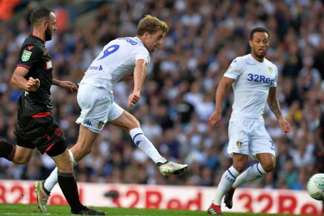 Patrick Bamford scores Leeds United's opening goal against Bolton.