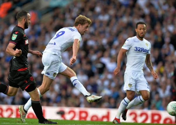 Patrick Bamford scores Leeds United's opening goal against Bolton.