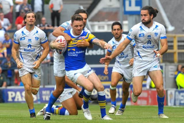 Richie Myler looks to break free against Toulouse.