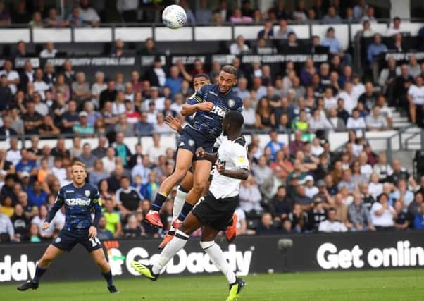 Kemar Roofe heads Leeds United in front at Derby County. Picture by Jonathan Gawthorpe.