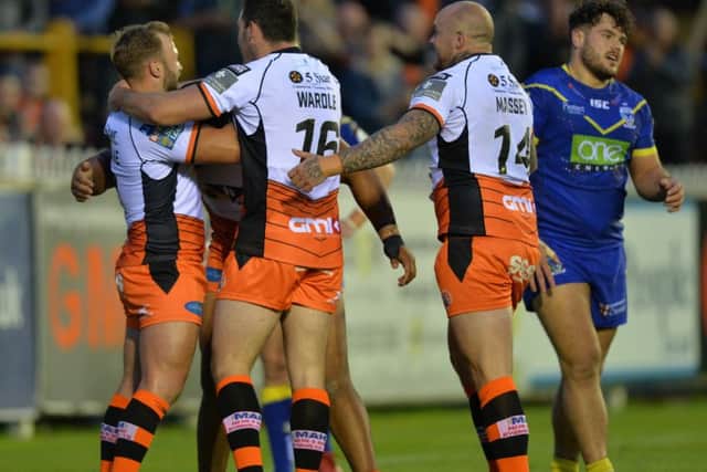 Tigers celebrate Junior Moore's scoring their second try.
Castleford Tigers v Warrington Wolves.   Super 8's, BetFred SuperLeague.  
17 August 2018.  Picture Bruce Rollinson