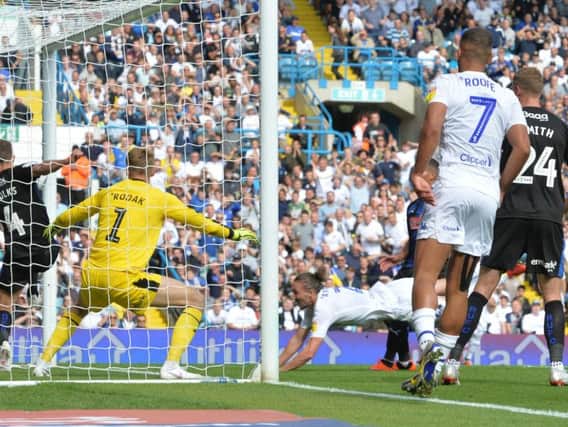 LUKE-ING GOOD: Leeds United's Luke Ayling gets in on the act with his diving header during Saturday's 2-0 win against Rotherham United at Elland Road. Picture by Bruce Rollinson.