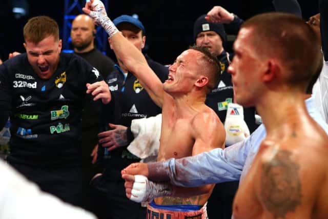 Josh Warrington celebrates his IBF featherweight win over Lee Selby at Elland Road in May.