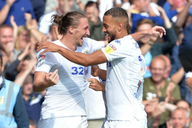 Luke Ayling celebrates his goal against Rotherham with Kemar Roofe.