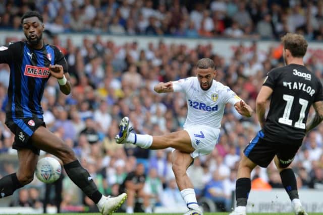 Kemar Roofe's shot is blocked by Rotherham's Semi Ajayi.