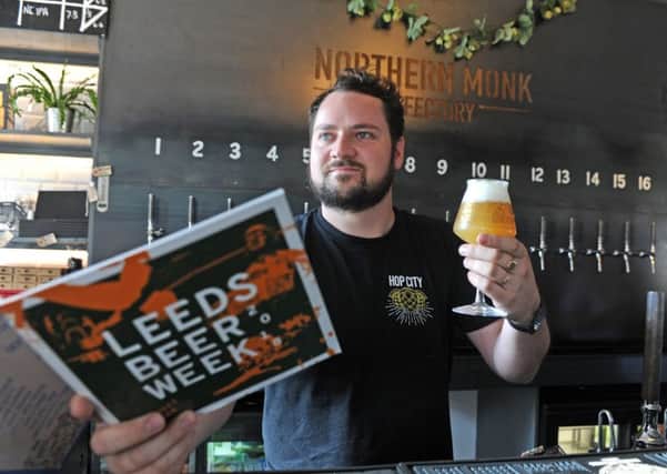Nick Pounder, area manager for Northern Monk, with Crypto Currency by USA brewer KCBC, a beer imported from USA which has never been available in the country before. Picture by Tony Johnson.