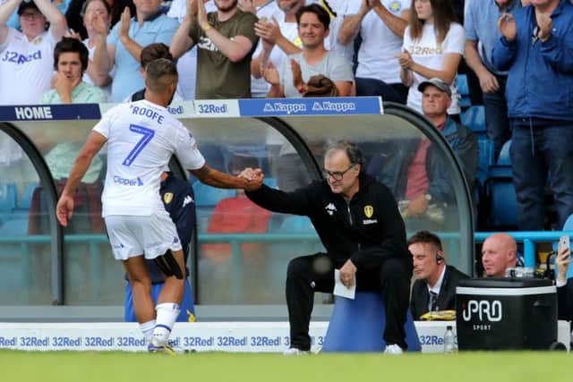 Leeds United's Kemar Roofe and head coach Marcelo Bielsa. PIC: Richard Sellers/PA Wire