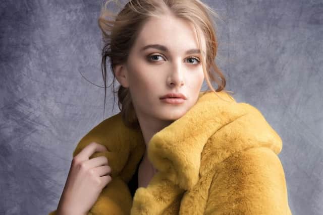 Mustard faux fur coat, Â£259, by James Lakeland.
