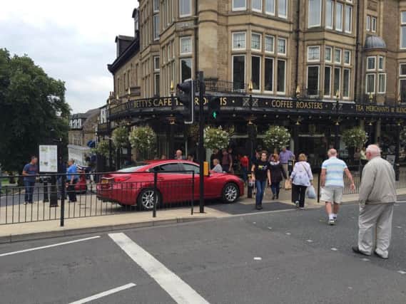 The car rolled into the canopy outside Bettys in Harrogate, damaging the structure