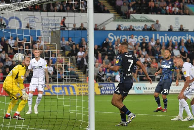 Leeds United's Kemar Roofe scores against Swansea City.