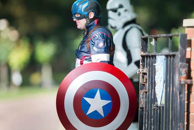 Captain America makes an appearance at Stanley Metcalf's funeral